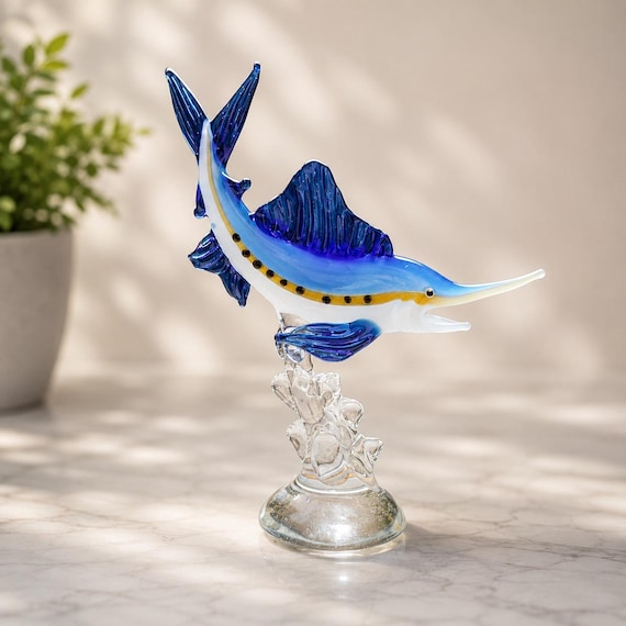 A $4,200 handmade blown-glass swordfish sculpture — the kind of one-of-a-kind nautical art object that stops guests dead in their tracks.