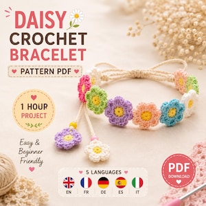 May include: A crochet bracelet featuring a series of small, multi-colored daisy-shaped flowers in pink, green, purple, peach, blue, and white with yellow centers. The bracelet has adjustable cream-colored strings with two dangling flower charms.