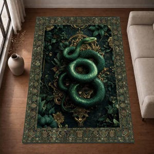 May include: A rectangular area rug featuring a central coiled green snake resting on an ornate gold frame. The background consists of dark green foliage and leaves. The rug has a wide, decorative border with intricate patterns in shades of green.