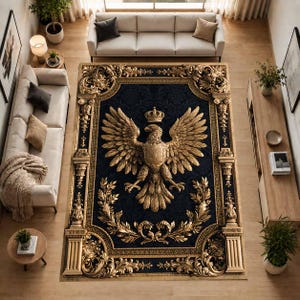 May include: A rectangular area rug featuring a dark navy blue center with a large, detailed gold eagle emblem centered beneath a crown. The border displays ornate gold architectural columns and intricate scrollwork patterns on all four sides.