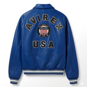 May include: A bright blue leather jacket with the word "AVIREX" across the shoulders and "USA" below. The back of the jacket features a circular patch with stars and stripes and the words "ALL AMERICANS" and "1975". The jacket has a classic bomber style with a striped hem.