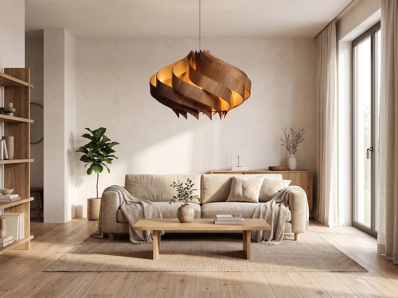 May include: A contemporary living room with a large, wooden, spiral pendant light. The light hangs above a beige sofa with cushions and a wooden coffee table. A rug and plants complete the warm, inviting space, creating a relaxing atmosphere.
