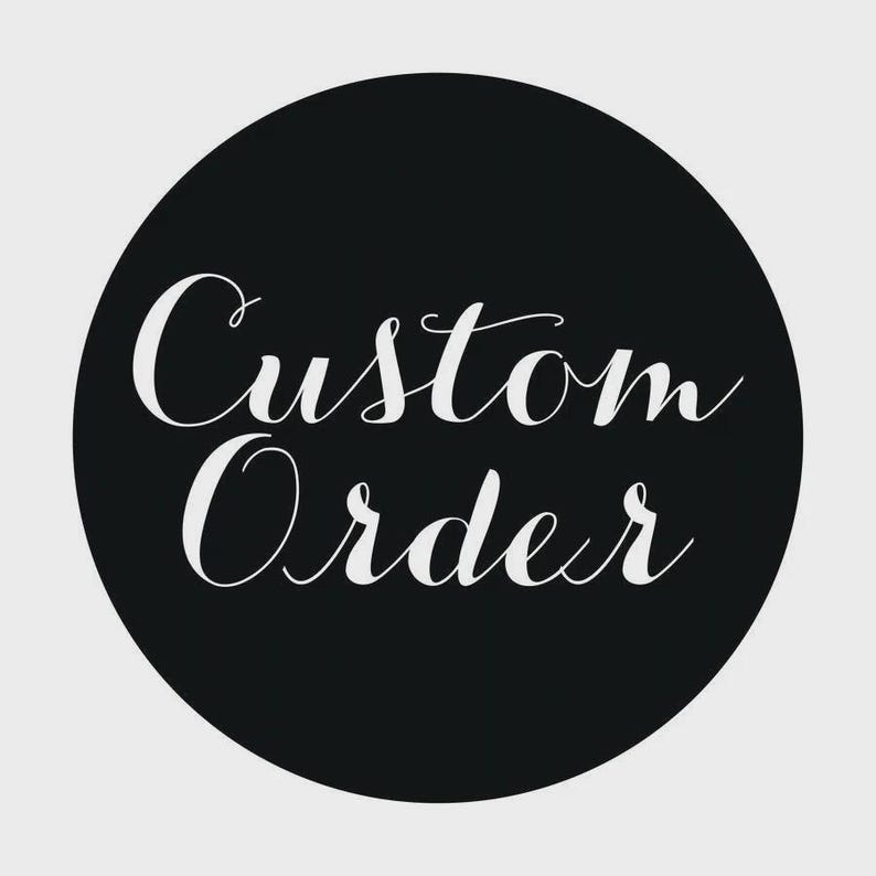 May include: A circular black graphic featuring the white text Custom Order written in a flowing, elegant script font. The design is centred within the circle, providing a clear and legible display of the words against the dark background.