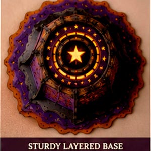 May include: A circular, multi-layered decorative base featuring a deep purple and orange color scheme. The center displays a bright yellow star surrounded by a ring of smaller stars and geometric cutouts. The text STURDY LAYERED BASE is visible.