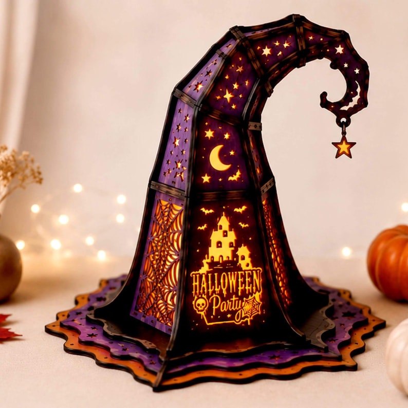 May include: A decorative witch hat lantern featuring a purple and black color scheme with cut-out designs of stars, a crescent moon, bats, a haunted house, and spider webs. The text "HALLOWEEN Party" is illuminated in orange light on the front.