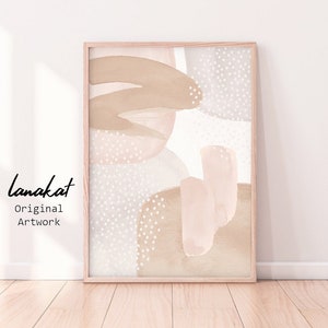 May include: Abstract art print with a white background and brown and pink shapes. The print is framed in a light wood frame.