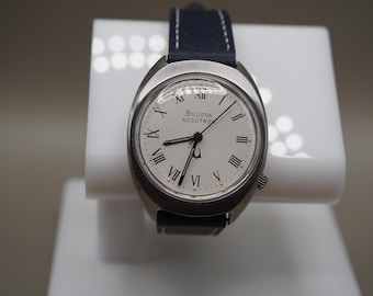 Relógio Bulova Accutron Cal 219 de 1977 – Mostrador com algarismos romanos, aço inoxidável, revisado.