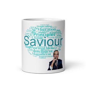 May include: White ceramic mug with a word cloud design including words such as "Saviour", "Principles", and "Migration". A portrait of a man in a suit is also on the mug. The mug is a standard size for tea or coffee.