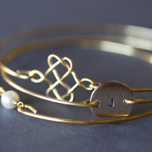 Set Of Three Thin Brass Bangles-Stamped initial, Single Pearl, Celtic Knot Bracelet, Gold Stackable Bangles,Bridesmaids Jewelry,Wedding Gift