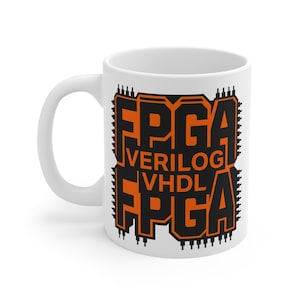 May include: White ceramic mug with a black and orange design. The design features the word "FPGA" in large letters, along with "Verilog" and "VHDL". The mug has a curved handle and a glossy finish.