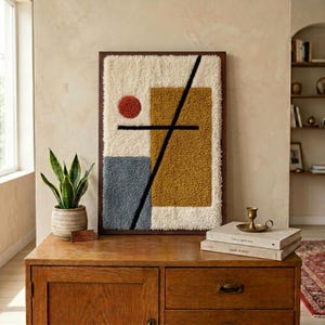 Cuadro de lana marroquí enmarcado para pared – Textil abstracto, azul mostaza marfil, decoración Bauhaus.
