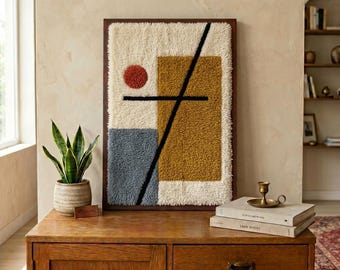 Cuadro de lana marroquí enmarcado para pared – Textil abstracto, azul mostaza marfil, decoración Bauhaus.