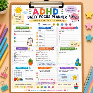 May include: A colorful ADHD daily focus planner sheet on a wooden clipboard. The planner features sections for priorities, daily tasks, focus tools, hydration, and wins. It includes illustrations of a brain, sun, and food, with text like ADHD DAILY FOCUS PLANNER.