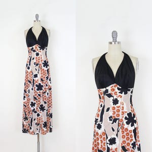 vintage 70s halter dress / 1970s floral halter dress / orange black dress / 1970s print maxi dress / open back dress / mod floral dress
