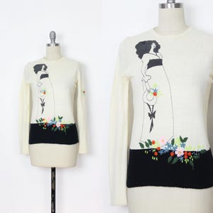vintage 1970s Aubrey Beardsley sweater / 1970s lady figural sweater / 70s jumper / novelty knit / novelty jumper / 1970s knit top