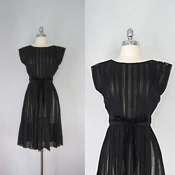 Vintage 1950s Dress. Black chiffon and a velvet bow. Cocktail dress.