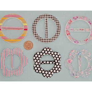 6 Assorted Scarf Slide/Ring/Clip or T-Shirt/Buckle/Ring. Assorted Shapes & Designs. Round, Flower, Shape, Dots, Stripes, Floral. 05082