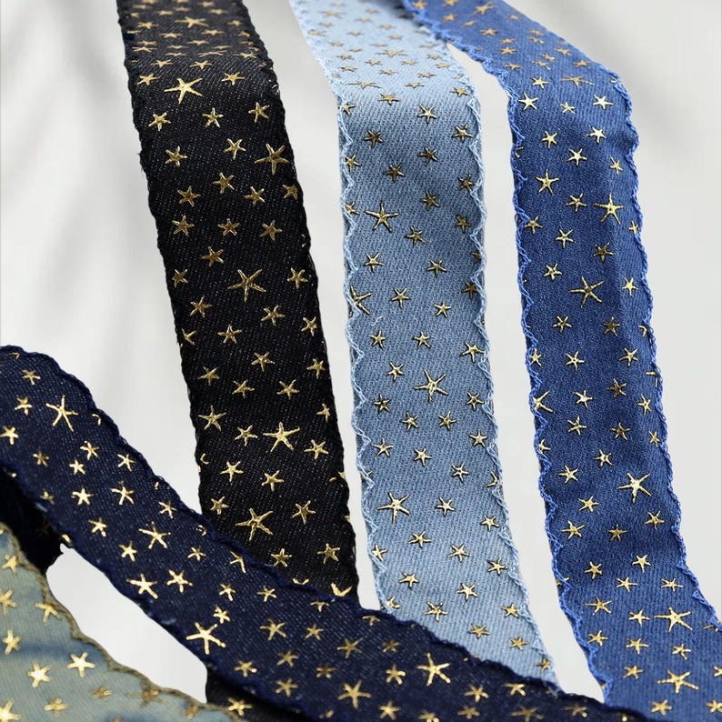 1.	Denim ribbon with embossed star pattern 
2.	Vintage washed denim ribbon for DIY crafts 
3.	3D star textured ribbon close-up 
4.	Blue jean ribbon with decorative edge trim 
5.	Black denim ribbon for fashion accessories 
6.	Textured ribbon for hair bow making 
7.	Assorted denim ribbons in multiple shades 
8.	Fabric ribbon for clothing embellishment 
9.	Stylish denim trim for handmade projects 
10.	Wide denim ribbon rolls for crafts