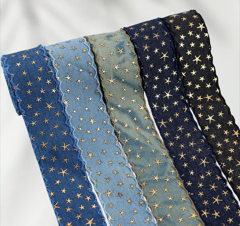 1.	Denim ribbon with embossed star pattern 
2.	Vintage washed denim ribbon for DIY crafts 
3.	3D star textured ribbon close-up 
4.	Blue jean ribbon with decorative edge trim 
5.	Black denim ribbon for fashion accessories 
6.	Textured ribbon for hair bow making 
7.	Assorted denim ribbons in multiple shades 
8.	Fabric ribbon for clothing embellishment 
9.	Stylish denim trim for handmade projects 
10.	Wide denim ribbon rolls for crafts