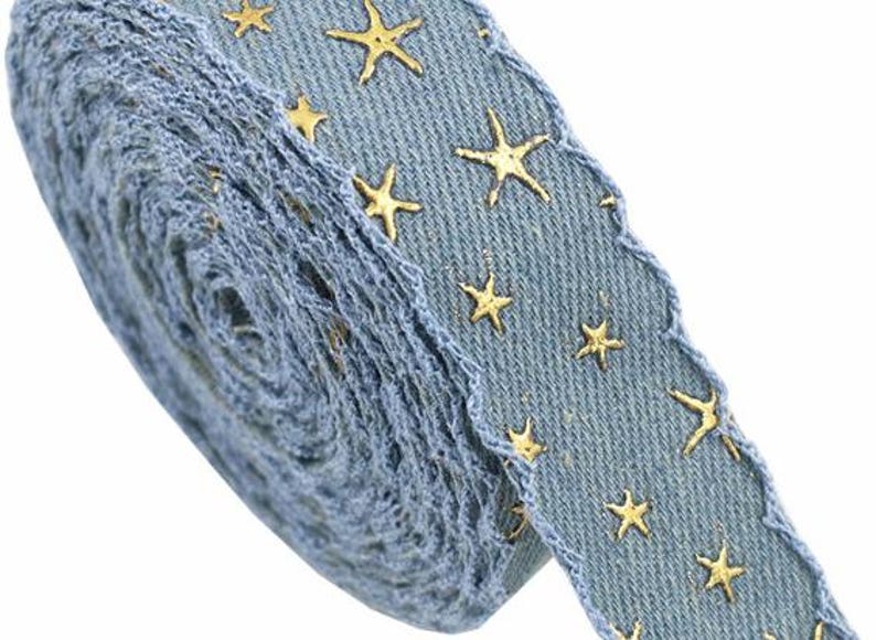 1.	Denim ribbon with embossed star pattern 
2.	Vintage washed denim ribbon for DIY crafts 
3.	3D star textured ribbon close-up 
4.	Blue jean ribbon with decorative edge trim 
5.	Black denim ribbon for fashion accessories 
6.	Textured ribbon for hair bow making 
7.	Assorted denim ribbons in multiple shades 
8.	Fabric ribbon for clothing embellishment 
9.	Stylish denim trim for handmade projects 
10.	Wide denim ribbon rolls for crafts