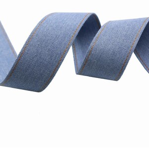 8.	Narrow denim ribbon strips for detailed craft work 
9.	Rustic denim ribbon bundle for DIY accessories 
10.	Soft jean ribbon material for sewing and design