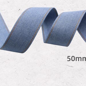 8.	Narrow denim ribbon strips for detailed craft work 
9.	Rustic denim ribbon bundle for DIY accessories 
10.	Soft jean ribbon material for sewing and design