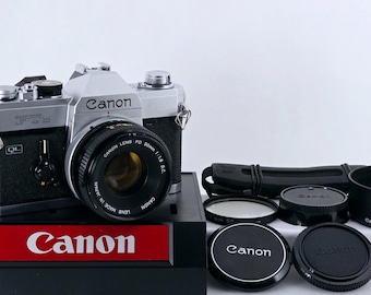 Fotocamera reflex a pellicola Canon FTB-N 35 mm, nuova, sigillata e in perfette condizioni, con obiettivo FD 50 mm F1.8, proveniente dal Giappone.