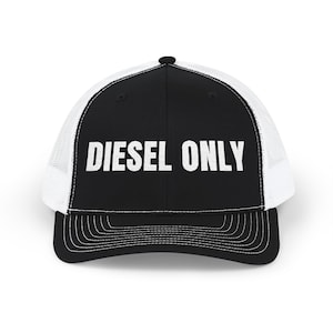 May include: Black and white trucker hat with the text "DIESEL ONLY" in bold, white letters. The hat features a black front panel and brim, with a white mesh back. The brim has multiple rows of stitching.