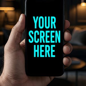 May include: A black smartphone with a dark screen displaying the bright cyan text "YOUR SCREEN HERE" in a bold, sans-serif font. The device features a slim bezel design and a rounded rectangular shape, presented as a digital mockup template.