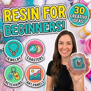 Puede incluir: Una guía titulada Resin for Beginners con 30 Creative Ideas que incluye iconos de joyería, posavasos, llaveros y paneles artísticos. Una persona sostiene una pieza de resina tipo geoda con purpurina rosa, blanca y azul verdoso y bordes dorados.