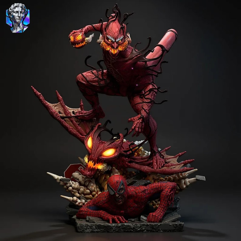 May include: A detailed statue featuring Spider-Man and two villains, the Green Goblin and a demonic figure. The Green Goblin is holding a pumpkin bomb. The figures are primarily red and black, with intricate detailing and a dynamic pose.
