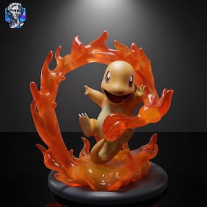 May include: A figurine of a small, orange, bipedal creature with a cream-colored belly and a wide, smiling mouth. The character is surrounded by a translucent, sculpted orange flame effect that forms a circular ring around its body.