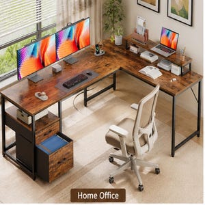 May include: L-shaped home office desk with a distressed wood finish and black metal frame. The desk features two computer monitors, a keyboard, and a laptop. A beige office chair is positioned in front of the desk. The image includes the text "Home Office".