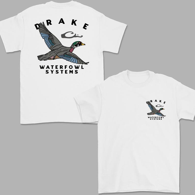 May include: White t-shirts with a graphic of a flying duck. The back of the shirt has a large duck graphic with the word "DRAKE" above it and "WATERFOWL SYSTEMS" below. The front of the shirt has a smaller version of the same graphic.