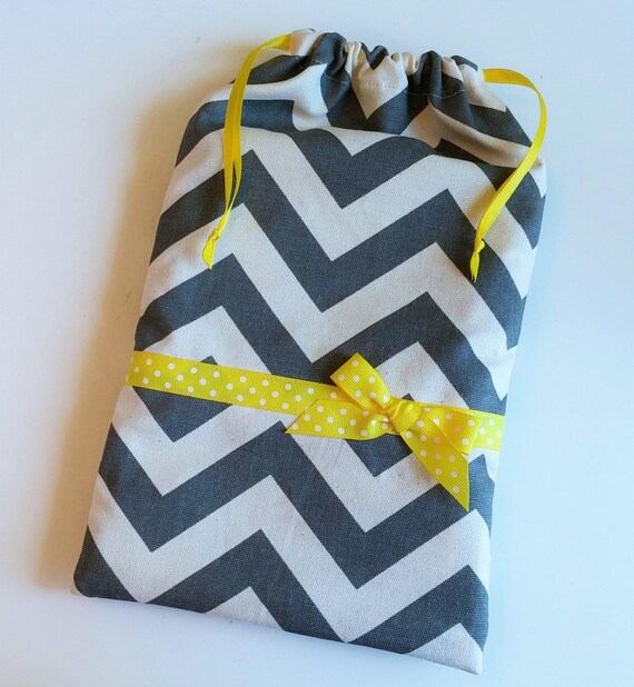 yellow and gray gift bags