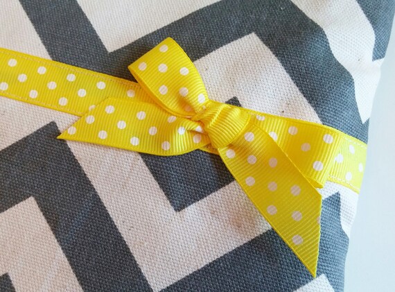 yellow and gray gift bags
