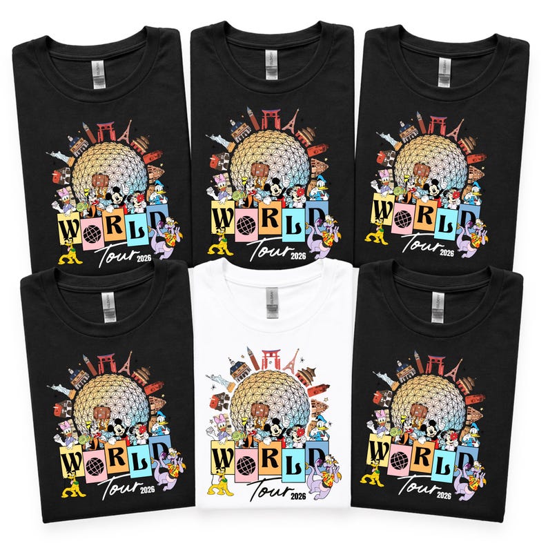 May include: Several black and white t-shirts with a vibrant graphic. The design showcases a large sphere, international landmarks, and cartoon characters. The text "WORLD Tour 2026" is included in the design.