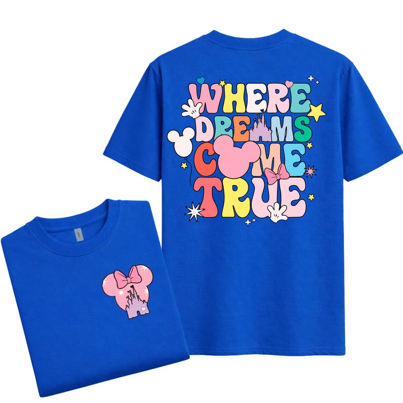May include: Two royal blue t-shirts. One shirt features a pink Minnie Mouse head graphic with a castle and bow. The other shirt displays the words "WHERE DREAMS COME TRUE" in colourful bubble letters, with Mickey Mouse hands, stars, and a castle.