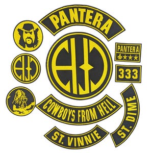 May include: A collection of black and yellow embroidered patches featuring the Pantera logo, the text Cowboys From Hell, St. Vinnie, St. Dime, 333, and circular designs including a portrait of a musician and the band's initials in a circular frame.