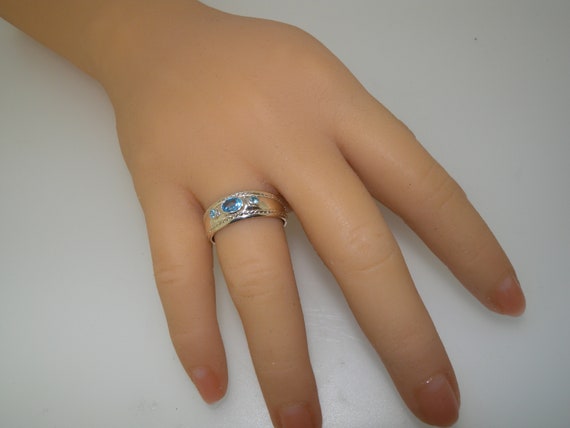 ANELLO IN ORO BIANCO CON DIAMANTI E TOPAZIO BLU LONDON – Gioielleria Taccetti