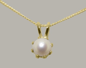 May include: A gold chain necklace with a single pearl pendant. The pearl is round and white, and the pendant is set in a gold setting.