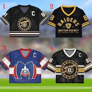 May include: Four mesh sports jerseys in black, blue, and white. Each jersey features a 'C' and a number on the sleeves. One jersey displays 'RAIDERS BOSTON HOCKEY EST. NINETEEN TWENTY-FOUR'. The jerseys have various logos and text.