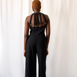 1980s black bare back jumpsuit with big gold buttons and rings // Vintage 80s California made minimalist wide leg overalls with side pockets zdjęcie 2