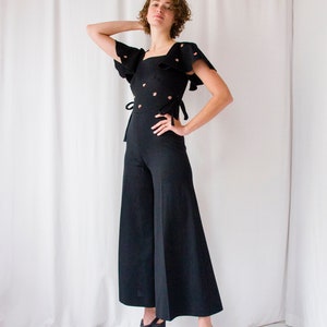 1970s black crepe flared leg jumpsuit with ruffled sleeves // Vintage 70s hippie bell bottom palazzo overalls image 2