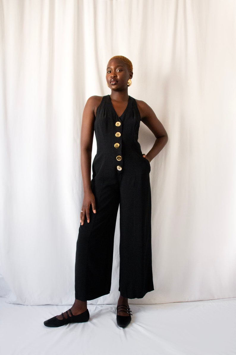 1980s black bare back jumpsuit with big gold buttons and rings // Vintage 80s California made minimalist wide leg overalls with side pockets zdjęcie 1