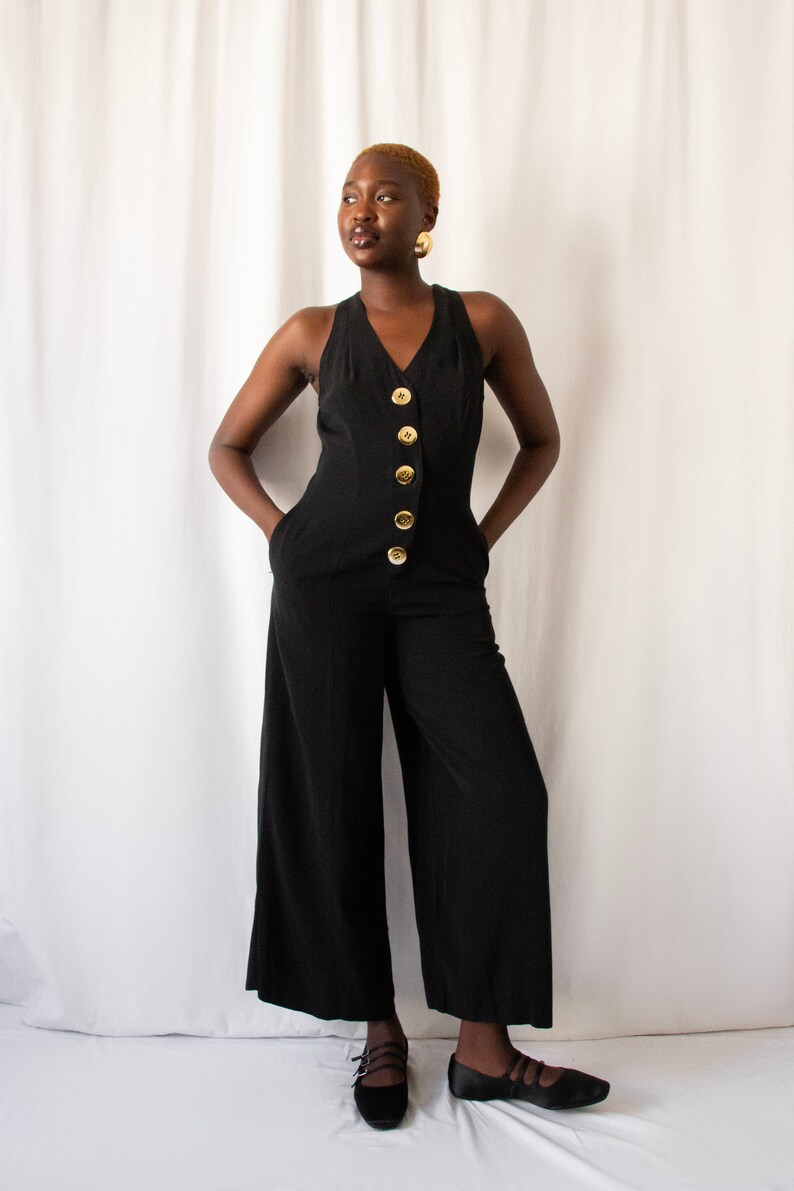 1980s black bare back jumpsuit with big gold buttons and rings // Vintage 80s California made minimalist wide leg overalls with side pockets zdjęcie 4