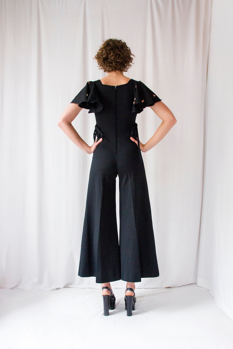 1970s black crepe flared leg jumpsuit with ruffled sleeves // Vintage 70s hippie bell bottom palazzo overalls image 3