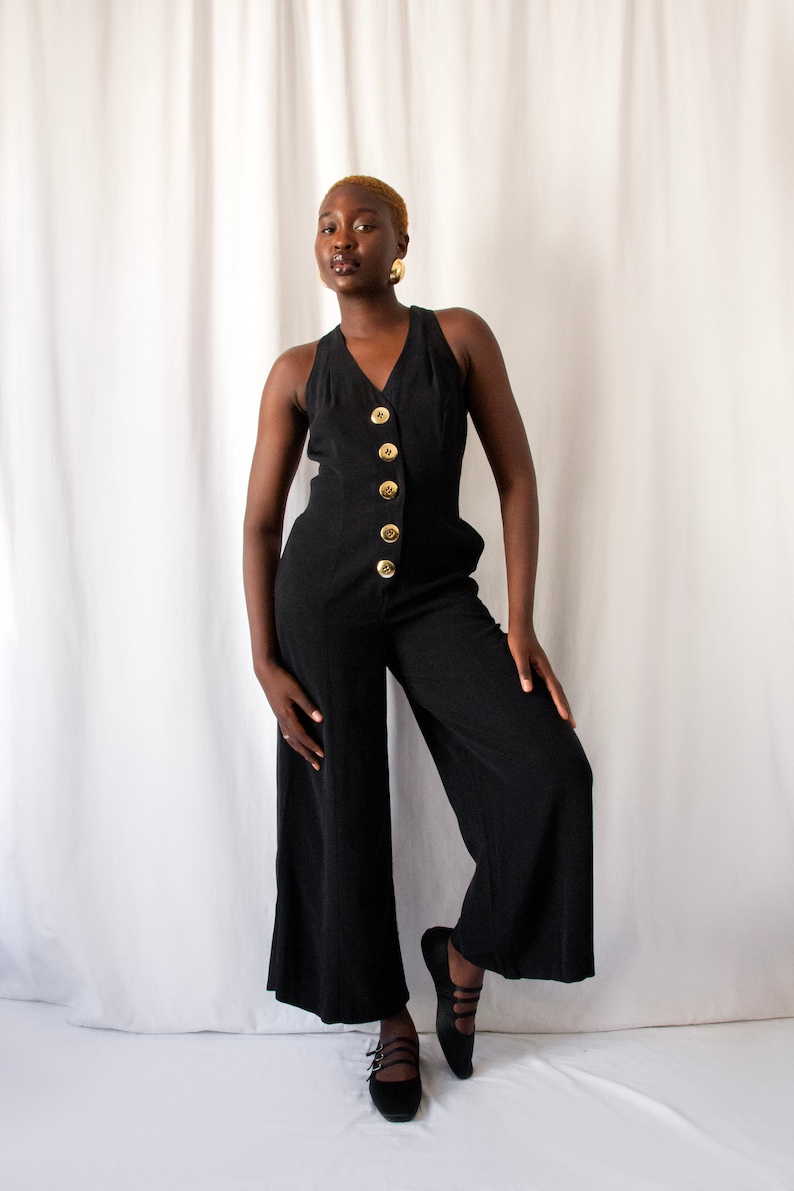 1980s black bare back jumpsuit with big gold buttons and rings // Vintage 80s California made minimalist wide leg overalls with side pockets zdjęcie 7