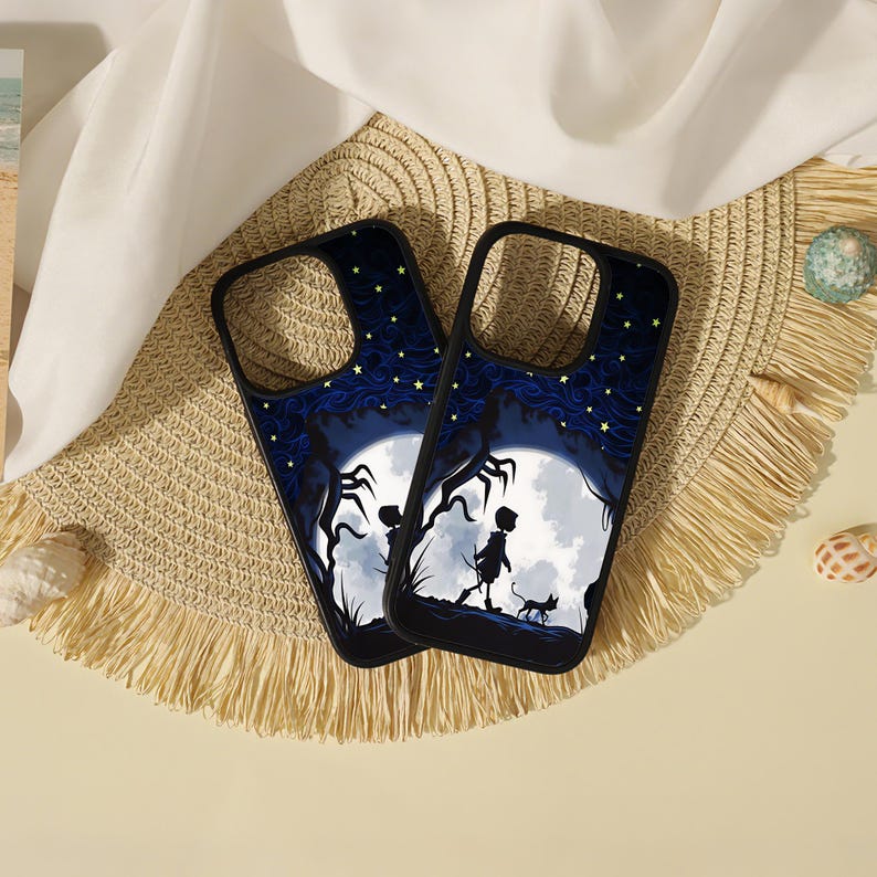 May include: Two black phone cases featuring a graphic illustration of a silhouette of a person and a cat walking under a large white moon against a dark blue starry sky with swirling patterns and dark tree branches on the sides.