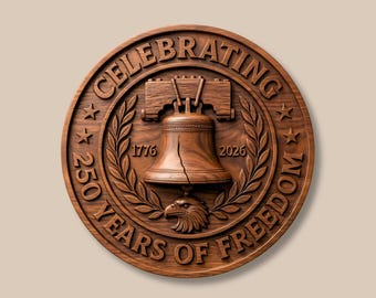 May include: A round, wooden plaque with the text "CELEBRATING 250 YEARS OF FREEDOM" encircling a detailed relief of the Liberty Bell, an eagle, and the years 1776 and 2026. The plaque is a warm brown color.